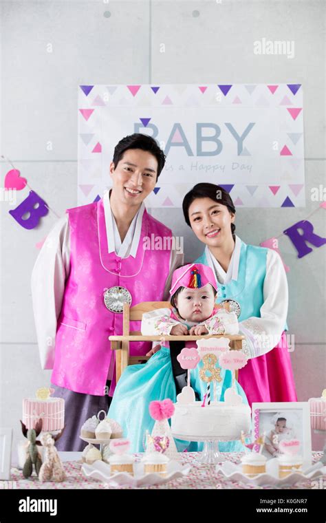 Harmonious Korean family at first birthday party Stock Photo - Alamy