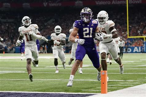 Texas can't complete Alamo Bowl comeback against Washington