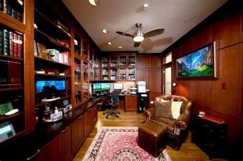 awesome man cave home office idea with a crazy comfy chair and TV set ...