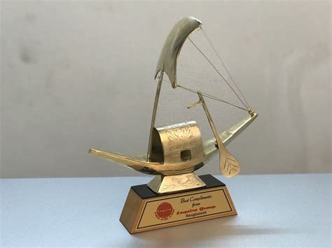 Brass molded boat | Trophy design, Brass, Company awards