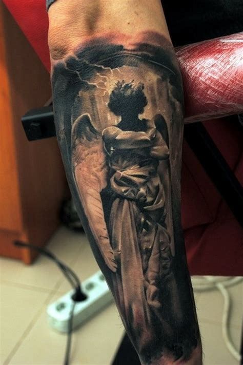 Dark angel tattoo on arm - Tattooimages.biz