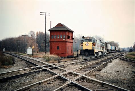 EL, Shenango, Pennsylvania, 1975 Eastbound Erie Lackawanna Railway freight train at XN Tower in ...