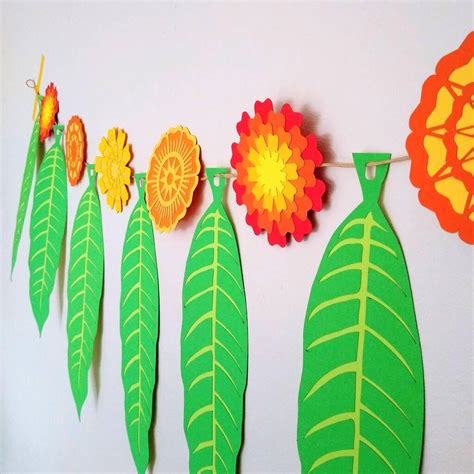 Paper Marigold Diwali Garland By Rosie and the Boys | notonthehighstreet.com