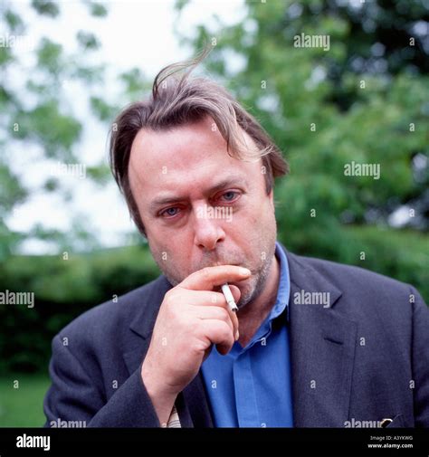 Author and Journalist Christopher Hitchens smoking a cigarette at the Hay Festival, Hay-on-Wye ...