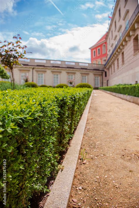 Castle gardens in front of Royal Castle in Warsaw, saxon facade Poland. Landscape design, park ...