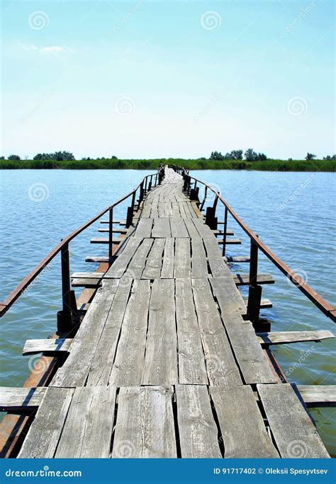 Abandoned Wooden Long Bridge Over the Lake Stock Photo - Image of outdoor, architecture: 91717402