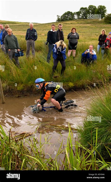 Competitor in the annual World Mountain Bike Bog Snorkelling Championships at Llanwrtyd Wells ...