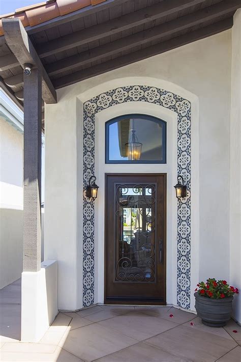 Sapnish Front door Front door is a custom wood, iron and glass door # ...