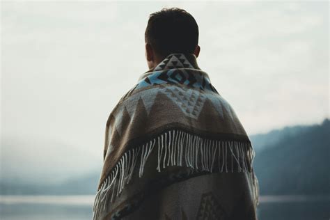 Person Wearing Brown Tribal Print Scarf · Free Stock Photo
