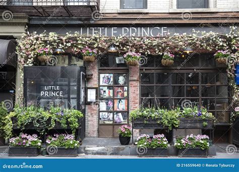 Plants and Flowers Growing Over a Restaurant or Cafe. Vintage Exterior of an Entrance Editorial ...