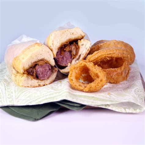 Beer Bratwurst Sandwich Recipe by Michael Symon | The chew recipes, Recipes, Grilling recipes