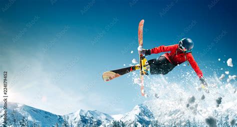 Skiing. Jumping skier. Extreme winter sports. Stock Photo | Adobe Stock