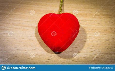 The Bright Red Heart Pendant-6 Lays on a Wooden Background. Stock Photo - Image of wooden ...