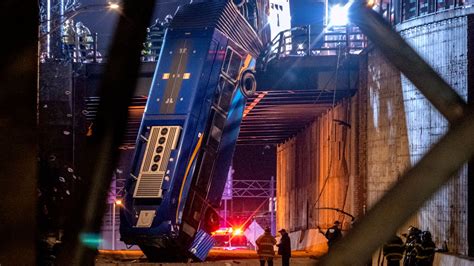 New York bus crash: Nine injured after vehicle plunges 49ft off bridge and into underpass | US ...