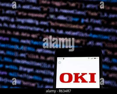 Oki Electric Industry Company logo seen displayed on smart phone Stock Photo - Alamy