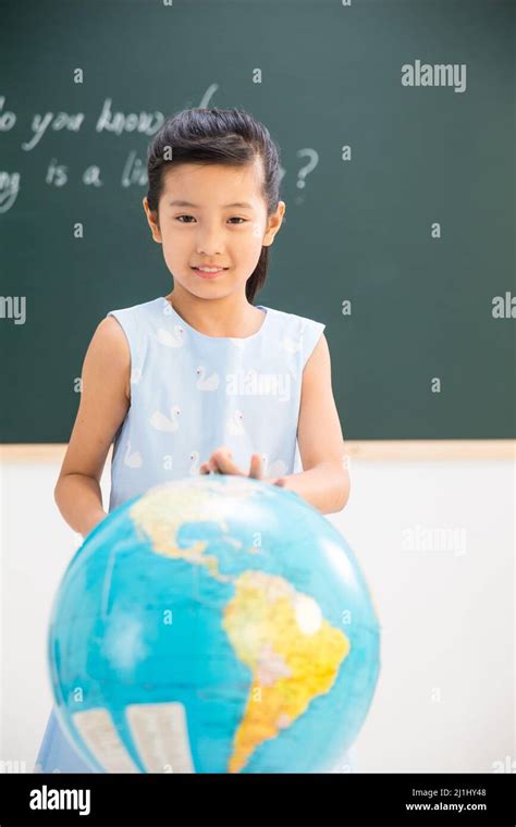 Primary school girls in the classroom Stock Photo - Alamy