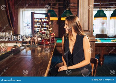 Beautiful Young Woman Sitting at the Bar Talking with the Bartender Stock Photo - Image of happy ...