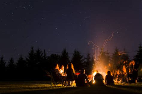 23 Campfire Games To Get Everyone Laughing On Your Next Camping Trip