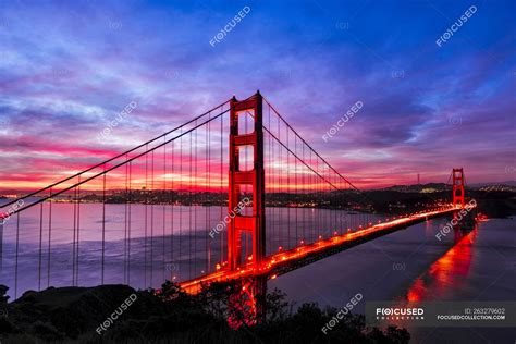 Golden Gate Bridge lit up at sunset, San Francisco, California, United ...