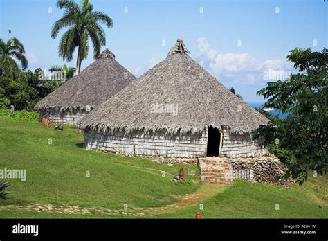 Houses in reproduction Taino Indian village, Chorro de Maita, Banes, near Guardalavaca, Holguin ...