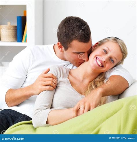 Stock Image: Happy intimate young couple snuggling. Image: 7372551