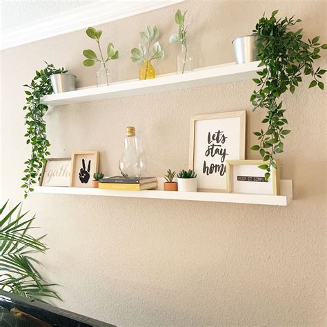 White floating shelves | Shelf decor living room, Floating shelves ...