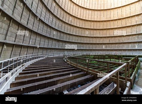 Inside a cooling tower of a nuclear power plant. Green overgrown Stock Photo - Alamy