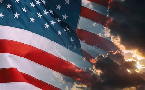 American Flag Waving In The Wind At Sunset Or Sunrise Stock Image ...