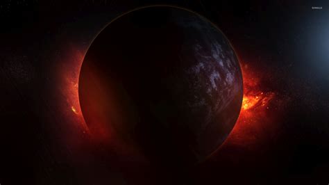 Red nebula hiding behind the dark planet wallpaper - Space wallpapers ...