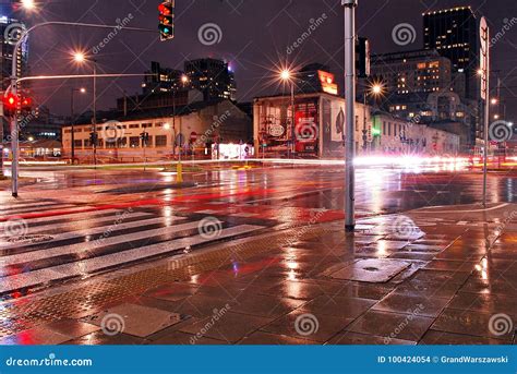 City traffic at night. editorial stock image. Image of puddle - 100424054