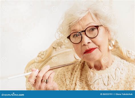 Smoking old woman – Telegraph