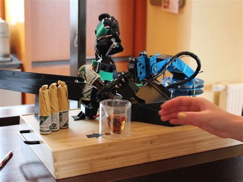 Mini Robotic Bartender automatically opens and pours a bottle of your ...