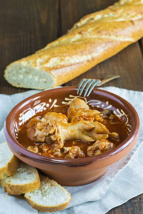 Crubeens with Tomato Sauce and Bread Stock Image - Image of pork, table: 99674747