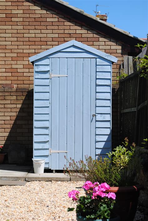 beautiful square feet: Our pretty blue shed.