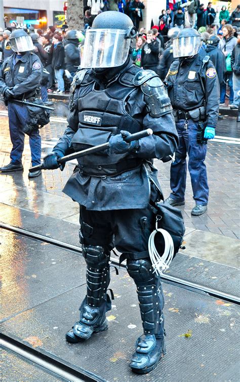 Riot police with baton, guns, pepper spray and body armor … | Flickr