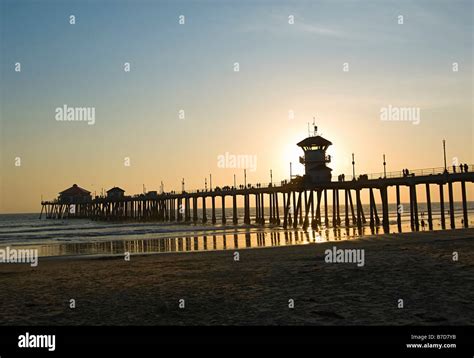 Huntington Beach Pier at Sunset Stock Photo - Alamy