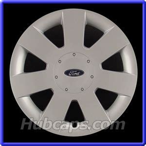 an image of a wheel cover for the ford logo on a black and blue background