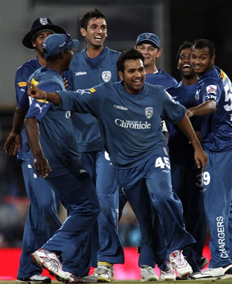 Rohit Sharma celebrates his hat-trick with Adam Gilchrist | ESPNcricinfo.com