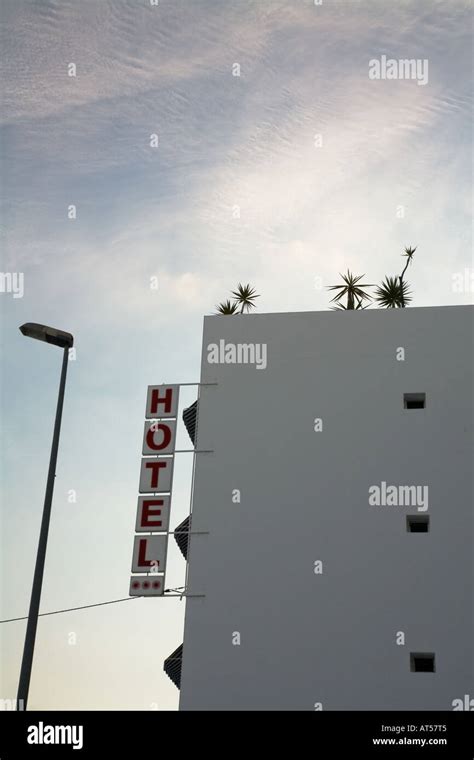 Hotel and lamp post Stock Photo - Alamy