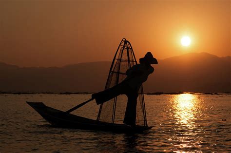 Sunset at Inle Lake Photograph by Maciej Rutkowski - Fine Art America