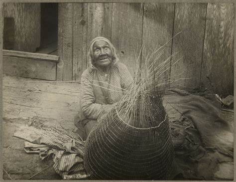 Photograph of an Indian woman sitting weaving a burden basket | Picture This