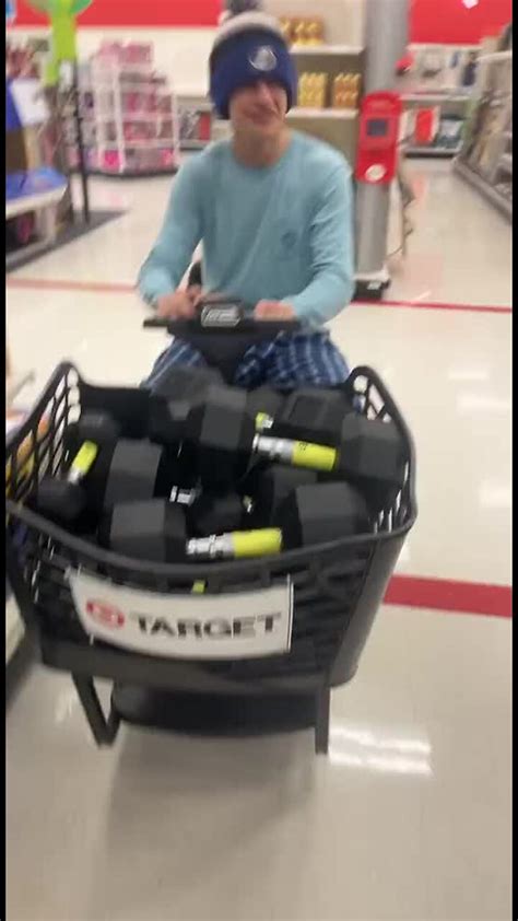 Kid tips over motorized shopping cart with too much weight in the front!.mp4