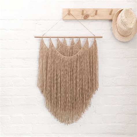 Natural wall hanging by Dear Musketeer. This gorgeous jute wall hanging is ideal for the bedroom ...