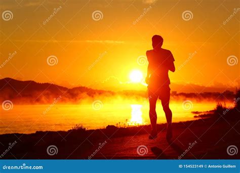 Runner Silhouette Running at Sunset on the Beach Stock Image - Image of individual, athletic ...