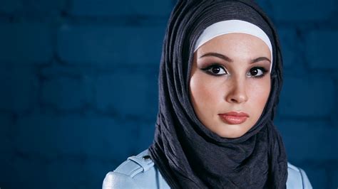 A Young Woman In Hijab Looks Directly At Stock Footage SBV-338838079 ...