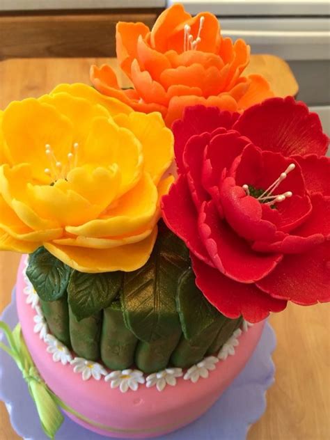 Flower bouquet birthday cake. | Chocolate flowers, Marshmallow fondant ...