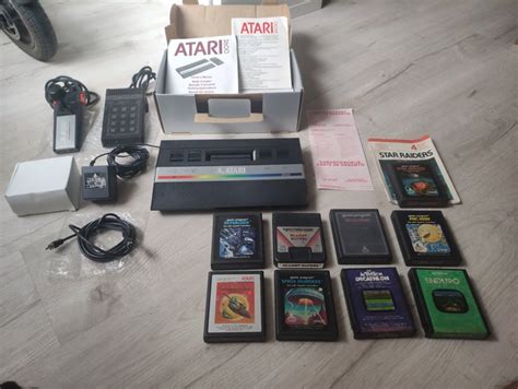 1 Atari 2600 - Console with games (9) - In original box - Catawiki