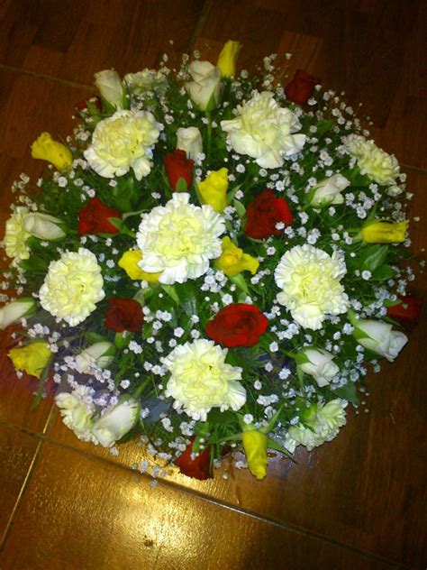 "buds white and red and gold". Funeral flowers for a rosary devotee. | Funeral flowers, Funeral ...