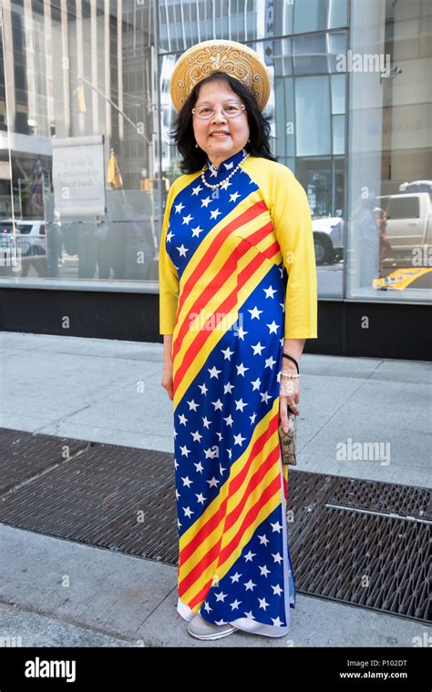 A patriotic Vietnamese immigrant wearing both the American & Vietnamese ...