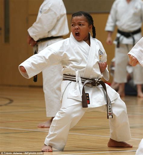 The youngest Karate Kid ever: Keychelle wins her black belt and she's ...